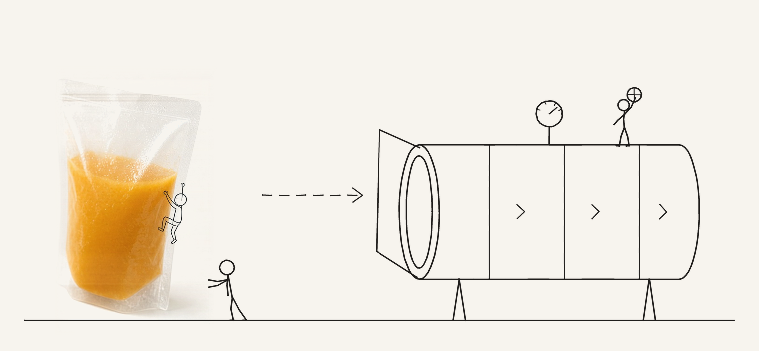 In-house HPP: fruit pack entering a high-pressure chamber with line-drawn figures